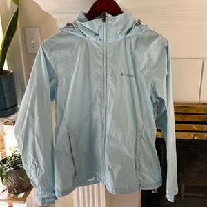 Columbia light blue rain jacket. Not rain proof but resistant. Worn once.